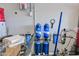 Water filtration system and utility components in a well-maintained utility room at 12841 W W . Via Camille --, El Mirage, AZ 85335