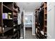 Well-organized walk-in closet with custom shelving and plenty of storage at 12841 W W . Via Camille --, El Mirage, AZ 85335