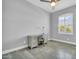 Office featuring a stylish desk, neutral paint, modern ceiling fan and shuttered window at 1487 E Laredo St, Chandler, AZ 85225