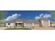 A charming single-story home boasts a three-car garage, desert landscaping, and a well-maintained lawn at 1906 E Cloud Rd, Phoenix, AZ 85086