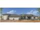 Charming single-story home featuring a neutral palette, low-maintenance desert landscaping, and an attached three-car garage at 1906 E Cloud Rd, Phoenix, AZ 85086