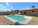 Backyard featuring a sparkling in-ground pool and low-maintenance landscaping at 2305 E Glade Ave, Mesa, AZ 85204