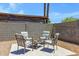 Outdoor living space with stylish seating and a cozy fire pit at 2305 E Glade Ave, Mesa, AZ 85204