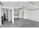 Large garage space with overhead storage and laundry area at 2305 E Glade Ave, Mesa, AZ 85204