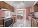 Kitchen featuring wood cabinets and stainless steel appliances at 2509 N Cheri Lynn Dr, Chandler, AZ 85225