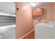 Functional laundry area with a washer, dryer, and overhead storage at 2509 N Cheri Lynn Dr, Chandler, AZ 85225