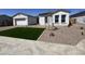 Charming single-story home featuring a nicely maintained front yard in a well-maintained neighborhood at 26232 N 77Th Dr, Peoria, AZ 85383