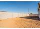 Spacious backyard featuring a new block fence and plenty of room for landscaping at 34865 N Palm Dr, San Tan Valley, AZ 85140