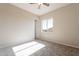 Bright bedroom featuring carpet, a window, and a ceiling fan at 34865 N Palm Dr, San Tan Valley, AZ 85140