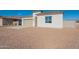 Charming single-story home with a beige color scheme and a well-maintained desert landscape at 34865 N Palm Dr, San Tan Valley, AZ 85140