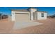 Charming single-story home with a beige color scheme and a well-maintained desert landscape at 34865 N Palm Dr, San Tan Valley, AZ 85140