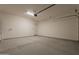 This two-car garage is equipped with an automatic roll-up door and is ready for your vehicles and storage at 34865 N Palm Dr, San Tan Valley, AZ 85140