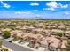 A scenic aerial view shows the home nestled among other houses, with mountains visible in the background at 3671 E Kingbird Pl, Chandler, AZ 85286