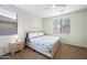 Bright bedroom with large windows, natural light, and a comfortable queen-sized bed at 3671 E Kingbird Pl, Chandler, AZ 85286