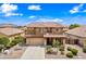 Charming two-story house featuring desert landscaping, a tile roof, and an inviting facade for curb appeal at 3671 E Kingbird Pl, Chandler, AZ 85286