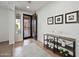 Welcoming foyer with tiled floors, an open entry, and charming decor at 3671 E Kingbird Pl, Chandler, AZ 85286