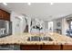 A kitchen with a large island, stainless steel appliances and granite counters at 3671 E Kingbird Pl, Chandler, AZ 85286
