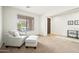 Cozy living room featuring comfortable seating and an abundance of natural light at 3671 E Kingbird Pl, Chandler, AZ 85286