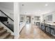 Open-concept living space with modern kitchen, dining area, and comfortable seating at 3671 E Kingbird Pl, Chandler, AZ 85286