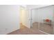 Bedroom featuring neutral carpet and a sliding closet door at 45475 W Guilder Ave, Maricopa, AZ 85139