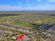 Aerial view of a golf community with beautiful homes and desert landscaping at 6714 E Amber Sun Dr, Scottsdale, AZ 85266