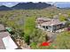 Expansive desert home boasts lush landscaping, pool, and mountain views at 6714 E Amber Sun Dr, Scottsdale, AZ 85266