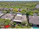 Aerial view of a golf community with beautiful homes and lush landscaping at 6714 E Amber Sun Dr, Scottsdale, AZ 85266