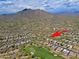 Beautiful aerial view of a golf community with mountain views at 6714 E Amber Sun Dr, Scottsdale, AZ 85266
