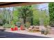 Backyard with a garden pond and a variety of plants at 6714 E Amber Sun Dr, Scottsdale, AZ 85266