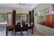 A dining room features natural light and patio access at 6714 E Amber Sun Dr, Scottsdale, AZ 85266