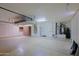 Spacious garage with ample storage cabinets and utility sink at 6714 E Amber Sun Dr, Scottsdale, AZ 85266