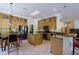 Modern kitchen with island, stainless steel appliances, and bar seating at 6714 E Amber Sun Dr, Scottsdale, AZ 85266