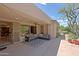Inviting outdoor living space with plush seating and stylish patio under string lights at 6714 E Amber Sun Dr, Scottsdale, AZ 85266