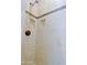 Shower with neutral tile, mosaic accents, and built-in shower niches at 6714 E Amber Sun Dr, Scottsdale, AZ 85266