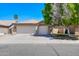 Charming single-story home with a three-car garage and well-maintained front yard at 902 W Saragosa St, Chandler, AZ 85225