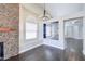 Cozy living room area with fireplace, shelving, chandelier, and vaulted ceilings at 902 W Saragosa St, Chandler, AZ 85225