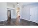 Main bedroom with wood floors and natural light, leading to ensuite bathroom at 902 W Saragosa St, Chandler, AZ 85225