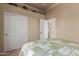 This bedroom showcases a closet, a ceiling fan and neutral tones for a relaxing atmosphere at 1019 N Tambor Cir, Mesa, AZ 85207