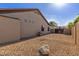Exterior of the property with desert landscaping provides low maintenance appeal at 1019 N Tambor Cir, Mesa, AZ 85207