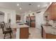 Well-appointed kitchen featuring granite countertops, stainless steel appliances, and modern cabinetry at 1019 N Tambor Cir, Mesa, AZ 85207