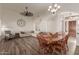 Bright and airy living room with comfortable seating, a dining area, and an open layout at 1019 N Tambor Cir, Mesa, AZ 85207