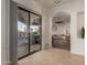 Inviting view of the outdoor patio through sliding glass doors, seamlessly blending indoor and outdoor living at 1019 N Tambor Cir, Mesa, AZ 85207