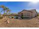 Relaxing pool area with desert landscaping, offering a tranquil outdoor retreat at 1019 N Tambor Cir, Mesa, AZ 85207