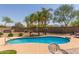 Gorgeous pool with desert landscaping, mountain views, and custom pavers at 1019 N Tambor Cir, Mesa, AZ 85207