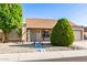 Charming single-story home featuring well-maintained landscaping and a decorative bridge walkway at 1207 E Sequoia Dr, Phoenix, AZ 85024