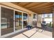 Covered patio with an outdoor dining set and a view of the swimming pool at 1207 E Sequoia Dr, Phoenix, AZ 85024
