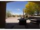 Back yard featuring outdoor seating, a patio, desert landscaping and mountain views at 18436 W Shasta St, Goodyear, AZ 85338