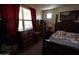 Bedroom with wooden furniture and traditional decor offers a cozy retreat at 18436 W Shasta St, Goodyear, AZ 85338