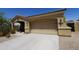 Attractive house with desert landscaping, covered entry, and two-car garage at 18436 W Shasta St, Goodyear, AZ 85338