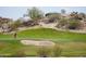 Scenic view of the golf course in the Estrella community at 18436 W Shasta St, Goodyear, AZ 85338